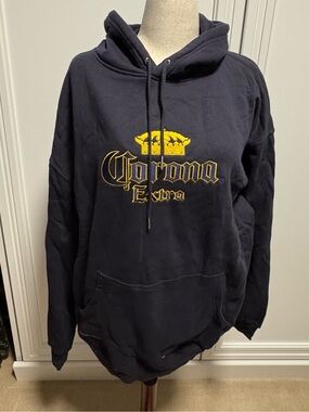 Stormtech Navy Hoodie with Yellow Corona Logo.  NWOT
